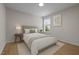Bedroom with a window view and hardwood flooring at 103 Burham Ct, Apex, NC 27502