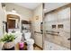 Bathroom showcasing updated vanity with a vessel sink, and a tiled walk-in shower at 1035 Aquilla Rd, Benson, NC 27524
