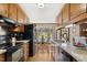 Bright kitchen featuring granite countertops and view of the breakfast nook at 1035 Aquilla Rd, Benson, NC 27524