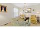 Bright living room with armchairs, lamps, sofa and decorative accents at 1035 Aquilla Rd, Benson, NC 27524