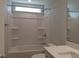 Bright bathroom features a shower and tub combination with a single sink vanity at 1042 Tulloch Court Ct # 213, Burlington, NC 27215