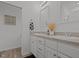 Bathroom with a dual sink vanity, framed mirror, and neutral wall color at 1051 Upland Reach, Sanford, NC 27332