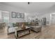 Open-concept living room with view of kitchen and stainless appliances, great for entertaining at 1051 Upland Reach, Sanford, NC 27332