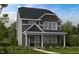 Charming two-story home with a covered front porch and well-maintained landscaping at 1053 Hardin Hill Ln, Knightdale, NC 27545