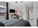 Bedroom with a desk and computer setup and a view of the outside at 1104 Briar Gate Dr, Holly Springs, NC 27540