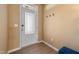 Inviting entryway featuring a glass panel front door and modern flooring at 1104 Briar Gate Dr, Holly Springs, NC 27540