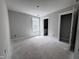 Unfinished room with a door, a window, and bare walls at 111 Weavers Grv Dr, Chapel Hill, NC 27514