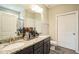 Bathroom featuring double sinks with granite countertop and shower at 1206 Newton Dr Dr, Mebane, NC 27302