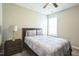 Cozy bedroom with a comfortable bed, side table, and a bright window for natural light at 1206 Newton Dr Dr, Mebane, NC 27302