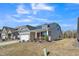 Charming home featuring a two-car garage and landscaped front yard at 1206 Newton Dr Dr, Mebane, NC 27302