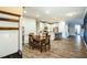 Bright kitchen with white cabinetry, granite countertops, and an open dining area at 1206 Newton Dr Dr, Mebane, NC 27302