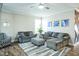 Living room featuring couches and a large window at 1206 Newton Dr Dr, Mebane, NC 27302