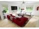 Spacious living room with modern furnishings, plush seating, and great natural light at 1216 Hardin Hill Ln, Knightdale, NC 27545