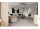 Inviting living room with an oversized sofa, modern decor, and lots of light at 1216 Hardin Hill Ln, Knightdale, NC 27545