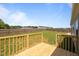 Backyard view from deck, showcasing lawn and fenced perimeter at 130 Ruby Trl, Roxboro, NC 27574