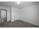 Bedroom with carpet and access to closet and door at 130 Ruby Trl, Roxboro, NC 27574