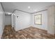 Versatile living area with neutral decor, natural light, and wood-look flooring at 130 Ruby Trl, Roxboro, NC 27574