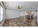 Bright living area that seamlessly connects to a modern kitchen and dining space at 130 Ruby Trl, Roxboro, NC 27574