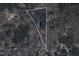 Aerial view of the property with forest and other homes nearby at 139 Trillium Pl, Chapel Hill, NC 27517
