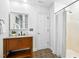 Clean bathroom featuring a vanity with granite countertop, a mirror, and a shower with a curtain at 139 Trillium Pl, Chapel Hill, NC 27517