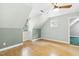 Spacious bedroom featuring hardwood floors, a ceiling fan, and neutral wall colors at 139 Trillium Pl, Chapel Hill, NC 27517