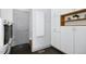 Well-organized laundry room with sleek cabinets and modern washer and dryer at 139 Trillium Pl, Chapel Hill, NC 27517