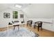 Bright home office with sleek desk, modern décor, and ample natural light at 139 Trillium Pl, Chapel Hill, NC 27517