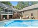Home's outdoor pool and deck offer a perfect blend of recreation and outdoor entertainment at 139 Trillium Pl, Chapel Hill, NC 27517