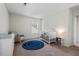 Comfortable Bedroom with a rocking chair, crib, and side table at 1406 Pebble Creek Xing, Durham, NC 27713