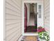 Inviting foyer with hardwood floors, an open staircase, and a glimpse of the upstairs at 1406 Pebble Creek Xing, Durham, NC 27713