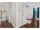 Hallway view of the main bedroom and laundry room for easy access at 1406 Pebble Creek Xing, Durham, NC 27713