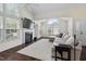 Spacious living room featuring a fireplace, ample natural light, and neutral decor at 1406 Pebble Creek Xing, Durham, NC 27713
