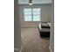 Bedroom with carpet, light-colored walls, a large bed, and a large window at 146 Verona Villa Dr, Burlington, NC 27215
