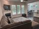 Living room with cozy fireplace, tv, and decorative area rug at 146 Verona Villa Dr, Burlington, NC 27215