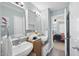 Bathroom features a double sink and is adjacent to the bedroom at 1634 Claiborne Ct, Raleigh, NC 27606