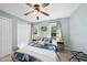 Serene bedroom with natural light, carpeted floors, and ample closet space at 1634 Claiborne Ct, Raleigh, NC 27606