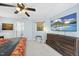 Relaxing bedroom with a large TV, and access to an ensuite bathroom at 1634 Claiborne Ct, Raleigh, NC 27606