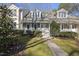Charming home featuring a welcoming front porch, manicured lawn, and inviting curb appeal at 1634 Claiborne Ct, Raleigh, NC 27606