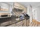Well-equipped kitchen with granite countertops, stainless steel appliances, and ample storage space at 1634 Claiborne Ct, Raleigh, NC 27606