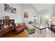 Bright living room featuring a comfortable sofa, area rug, and natural light for a welcoming atmosphere at 1634 Claiborne Ct, Raleigh, NC 27606