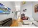 Airy living room featuring high ceilings, a staircase, and stylish decor, perfect for modern living at 1634 Claiborne Ct, Raleigh, NC 27606