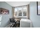Bright home office with natural light, a desk, and neutral walls at 1634 Claiborne Ct, Raleigh, NC 27606