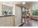 The Dressing room features built in drawers, a wall of mirrors and an abundance of natural light at 1846 Hammond St, Rocky Mount, NC 27803