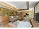 Bright living room featuring a stone fireplace, custom built-ins, and cozy seating at 1846 Hammond St, Rocky Mount, NC 27803