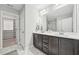 Contemporary bathroom features a double sink vanity and walk-in closet at 195 Solomon Dr, Cameron, NC 28326