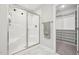Bright bathroom featuring a glass door shower and walk-in closet at 195 Solomon Dr, Cameron, NC 28326