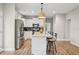 Modern kitchen with white cabinets, stainless steel appliances, and granite countertops at 195 Solomon Dr, Cameron, NC 28326
