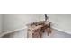 Office space featuring a wooden desk and carpeted flooring at 195 Solomon Dr, Cameron, NC 28326