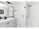 Contemporary bathroom offers a walk-in shower, granite vanity, and modern fixtures, providing spa-like experience at 2001 Turtle Point Dr, Raleigh, NC 27604