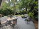 Expansive back deck with hot tub, outdoor seating, and lush greenery, perfect for relaxation and entertaining at 202 Howland Ave, Cary, NC 27513